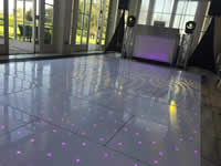 white dance floor with lights